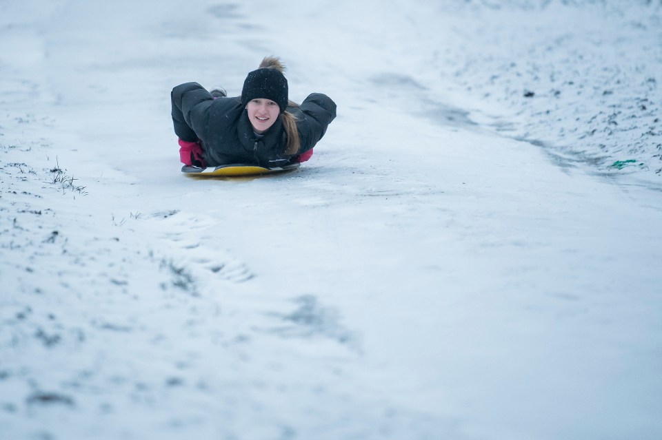 The snow was so heavy in Hampstead Heath this morning that one thrill-seeker took her boogie board out