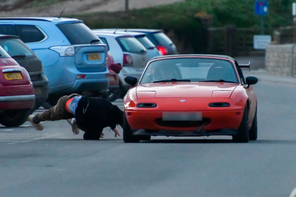 The dare-devil ends up with his face planted on the tarmac