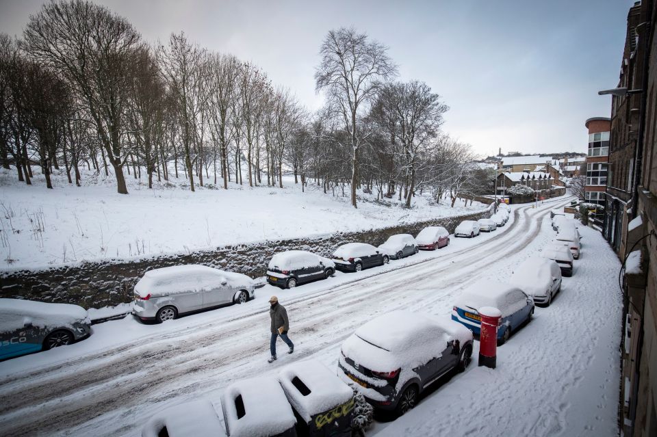 Snow covers the streets in Holyrood, Edinburgh