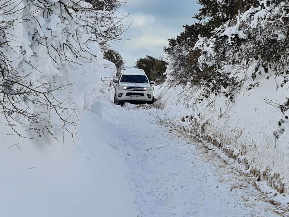 A car making a tough journey through snow in Folkestone