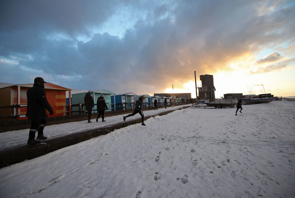 Snow falls on Whitstable beach in Kent, as the cold snap continues to grip much of the nation