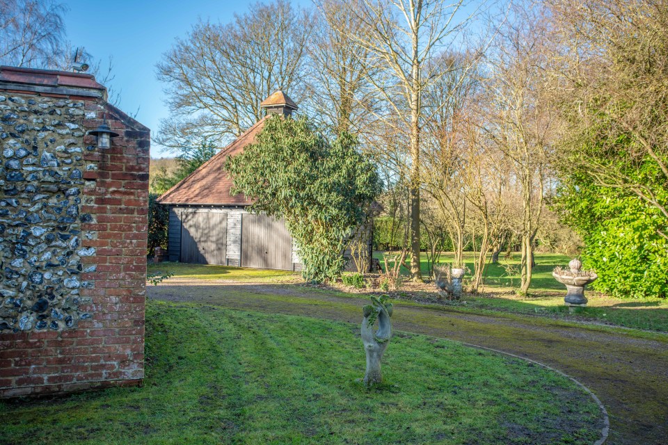 The grounds feature a partly-walled orchard