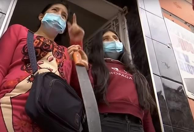 The girl and her mother speak to a local TV news reporter