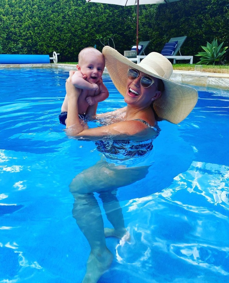 Jules enjoys a dip with her baby