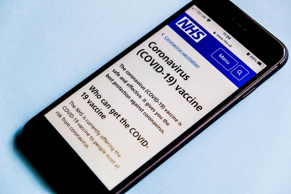 Fraudsters posing as NHS or pharmacy staff call asking for payment details to register for the vaccine — pictured official mobile NHS App