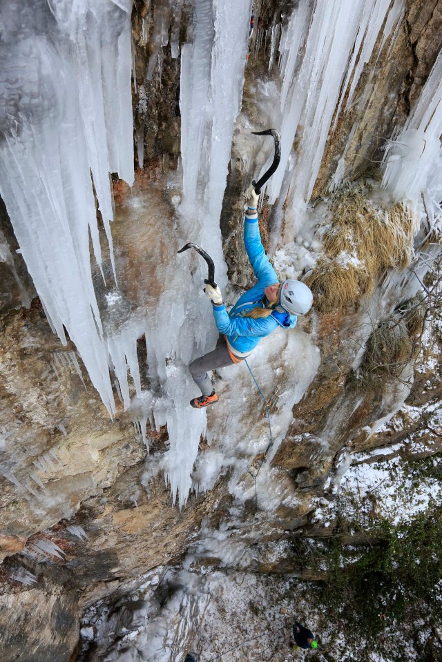 Brave Viki Marin climbs a frozen waterfall in Masson Lees Quarry ,Matlock, Derbyshire