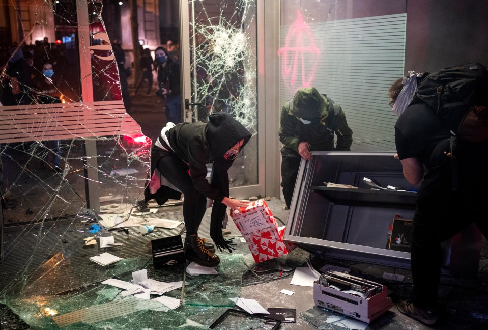 Rioters smashed into this bank branch in Barcelona