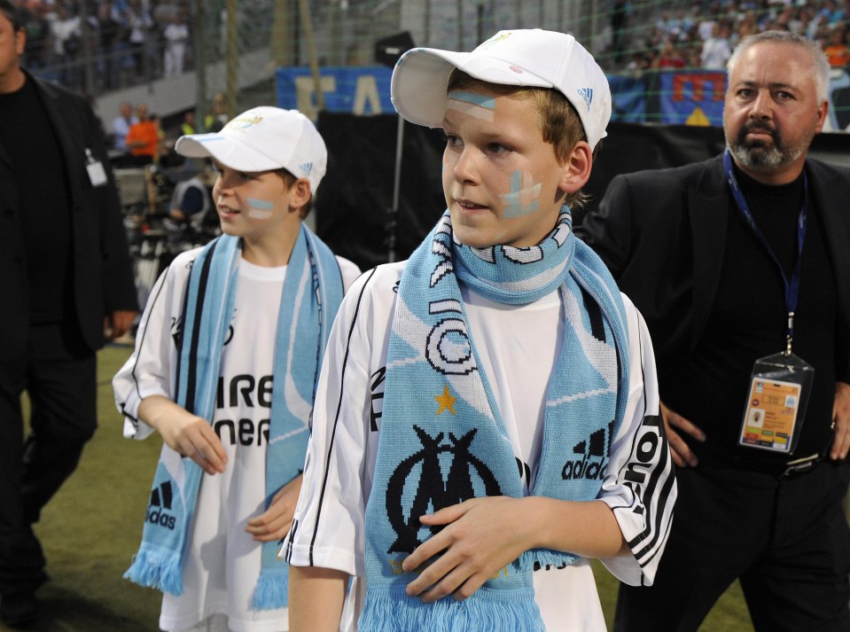 Kyril, pictured with twin brother Maurice, attend a Marseille game in honour of their late father in 2009