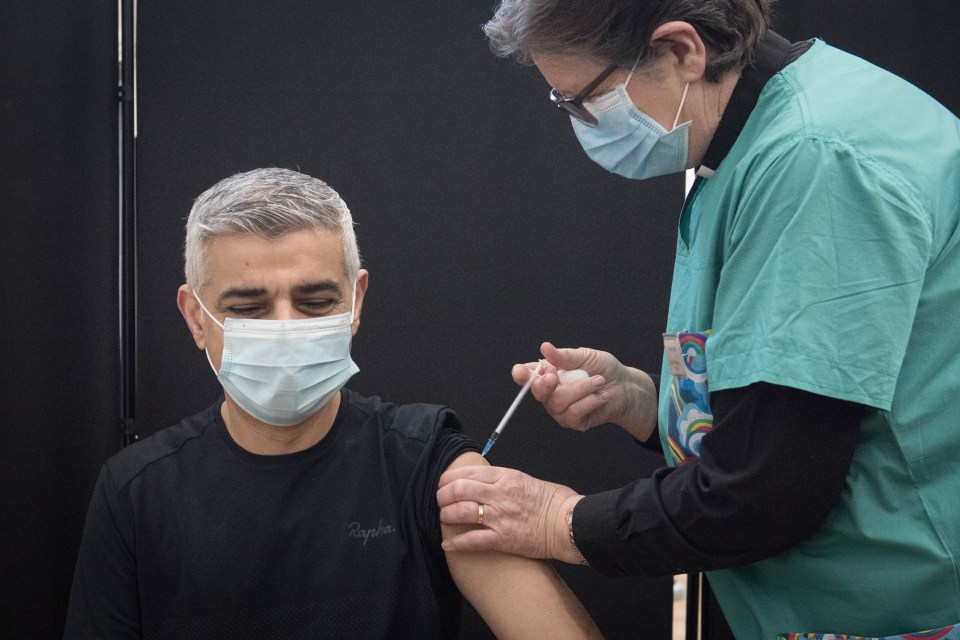 Mayor of London Sadiq Khan receives his first dose of the coronavirus vaccine, administered by Dr Sue Clarke