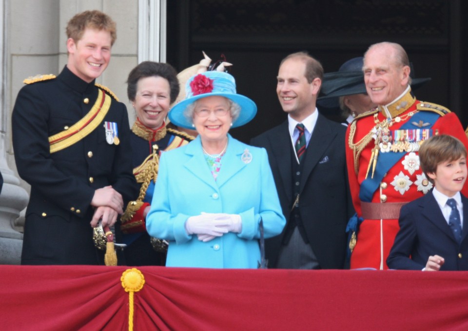 Prince Harry is seen here on the Buckingham Palace balcony with his family including Prince Philip