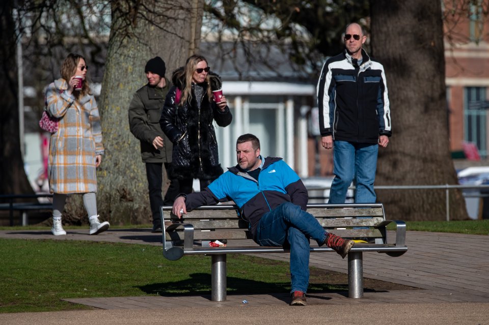 Locals hold onto their coffees while on their morning walk in Stratford-upon-Avon