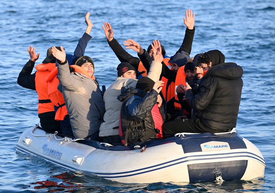 A group of migrants were escorted across the Channel into Britain by the French navy