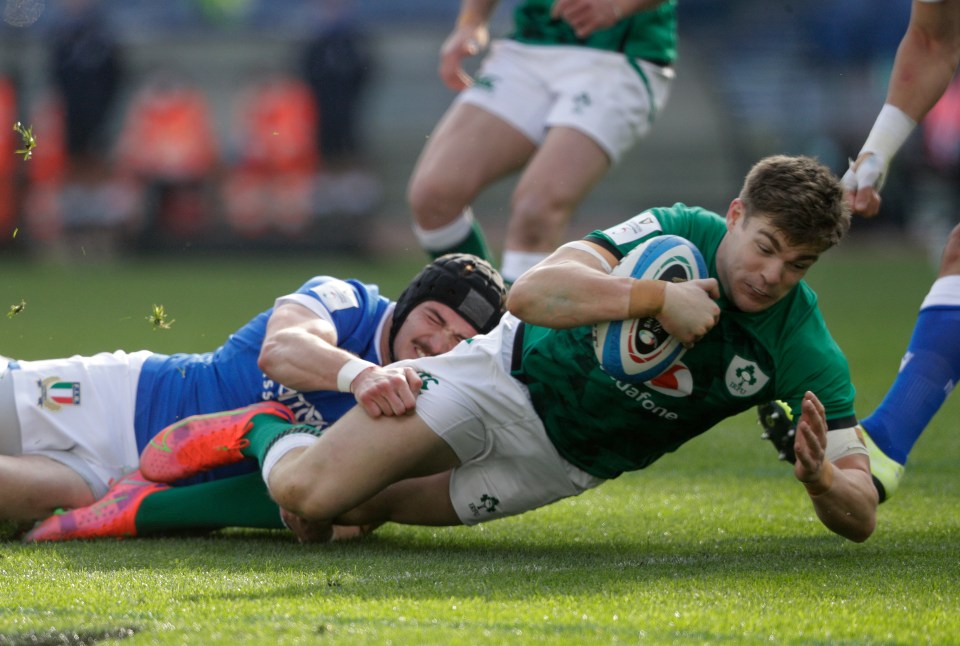 Garry Ringrose dives over the line to score Ireland's first try