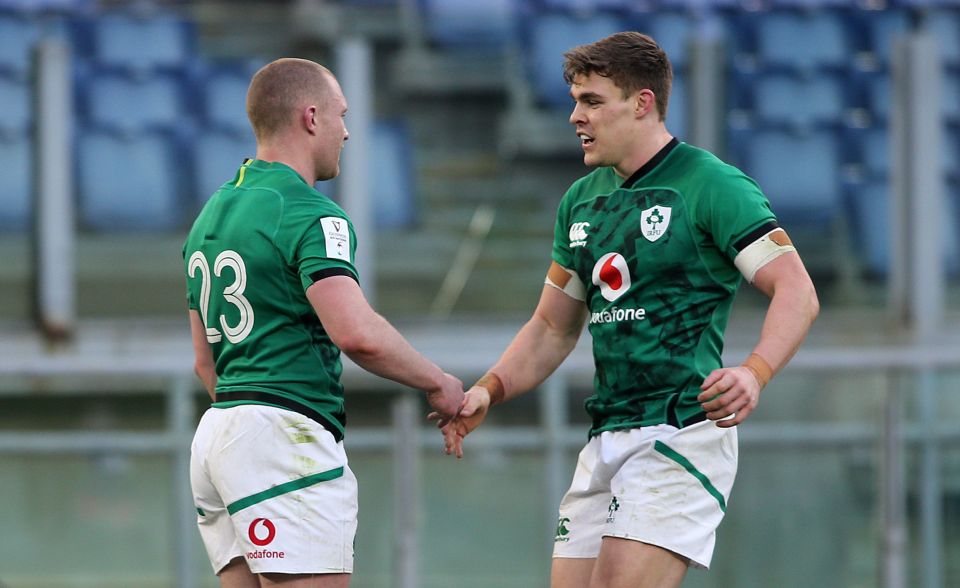 Keith Earls, left, is congratulated after scoring Ireland's last try