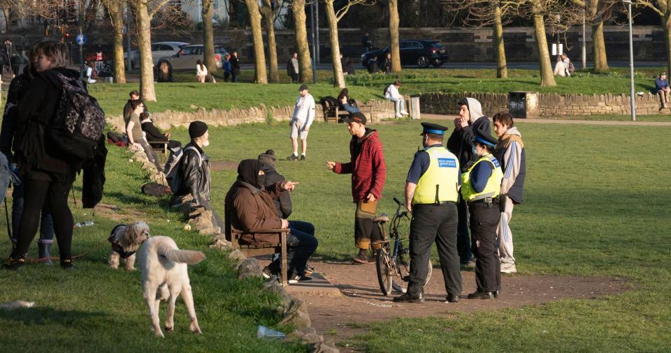 Officers check on people gathering in The Level park in Brighton city centre