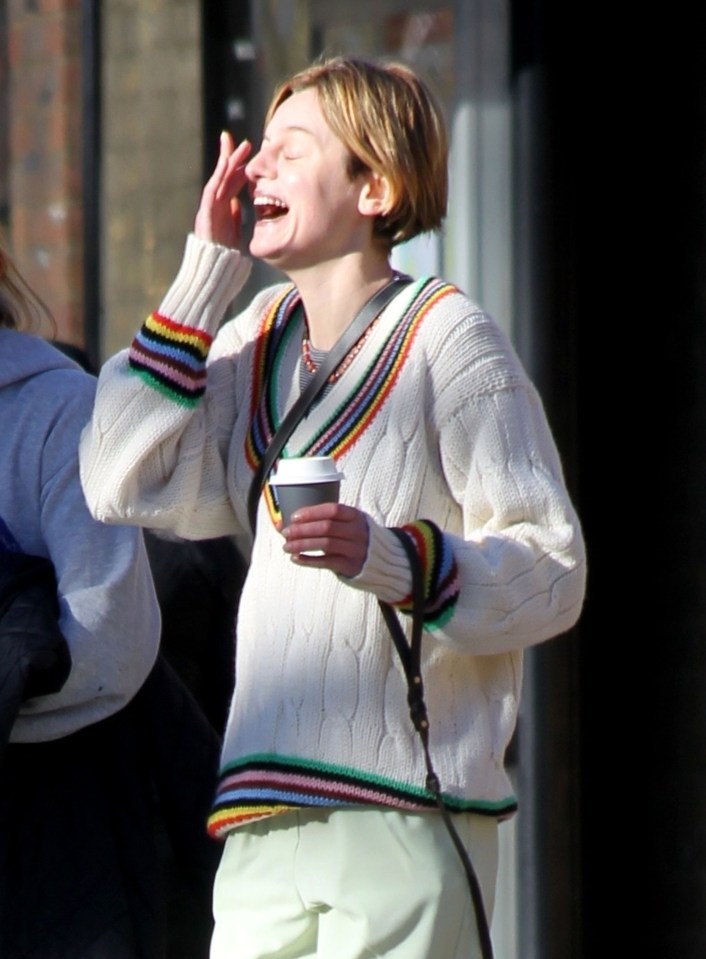 Golden Globe nominated Emma has a chuckle and grabs a coffee