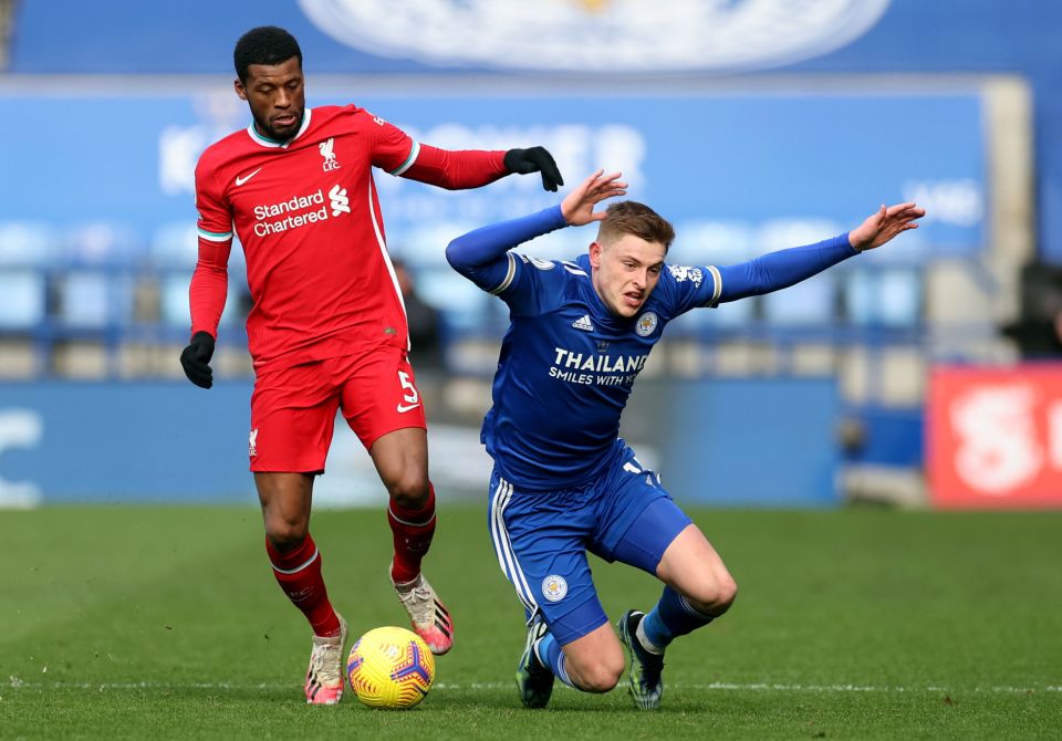 Georginio Wijnaldum tackles Leicester's Harvey Barnes