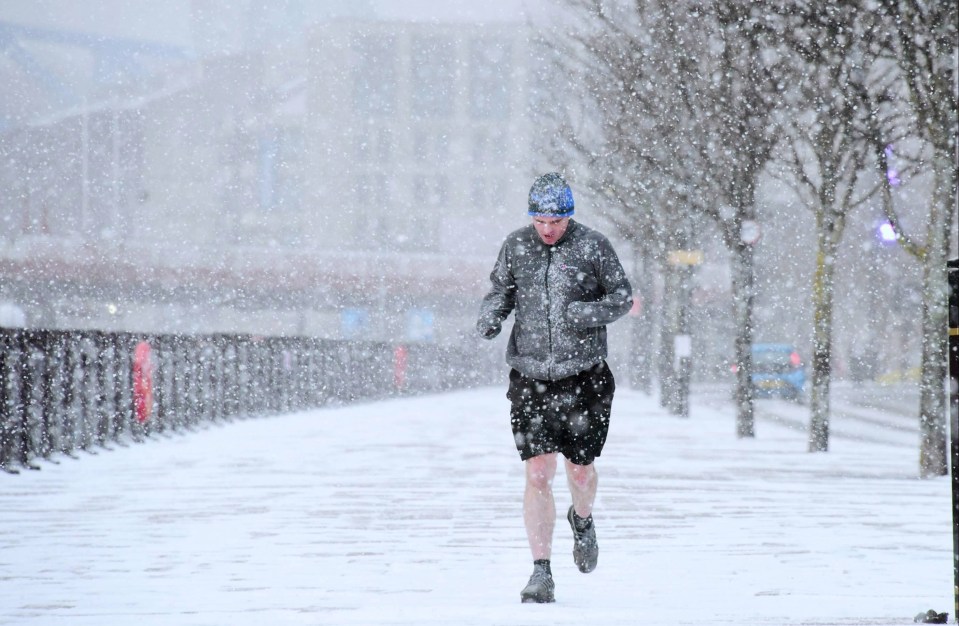 One hardy runner didn't miss the opportunity to jog through a blizzard in Newcastle