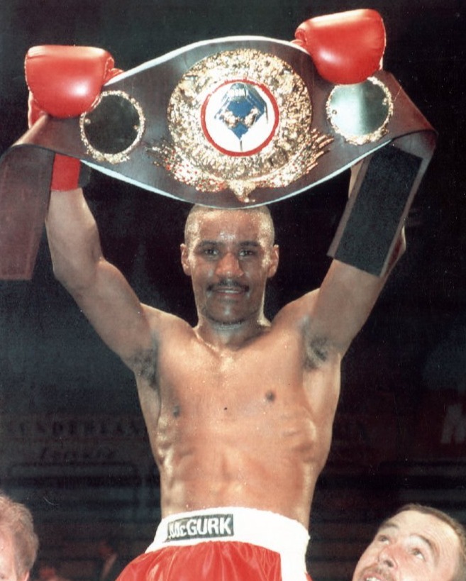 Former world champion boxer Steve Robinson - pictured here holding the WBO featherweight belt - is fundraising to open a new gym in Cardiff to try to help kids most likely to join gangs