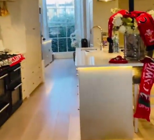 Carol has decked out her home with Welsh scarfs