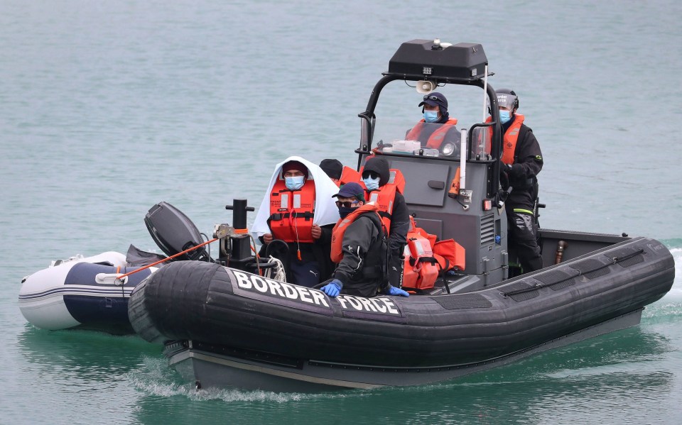 Migrants arriving in Dover after being picked up by a Border Force patrol