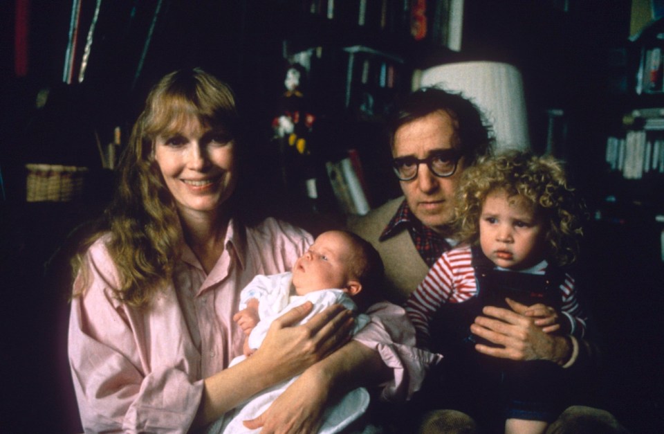 Mia Farrow with baby son Ronan and Woody Allen with daughter Dylan