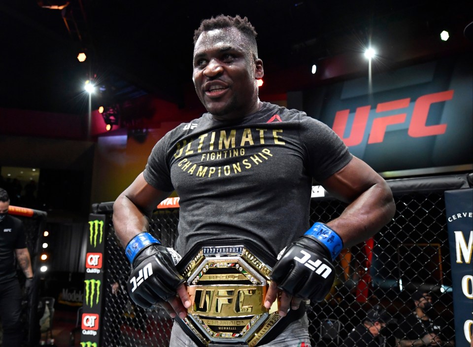 A jubliant Francis Ngannou celebrates his victory over Stipe Miocic