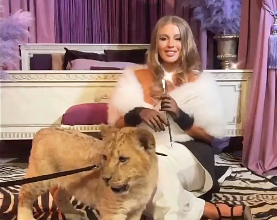 Yana Leventseva has complained of “death threats” after posing with a lion cub during celebrations for her 27th birthday