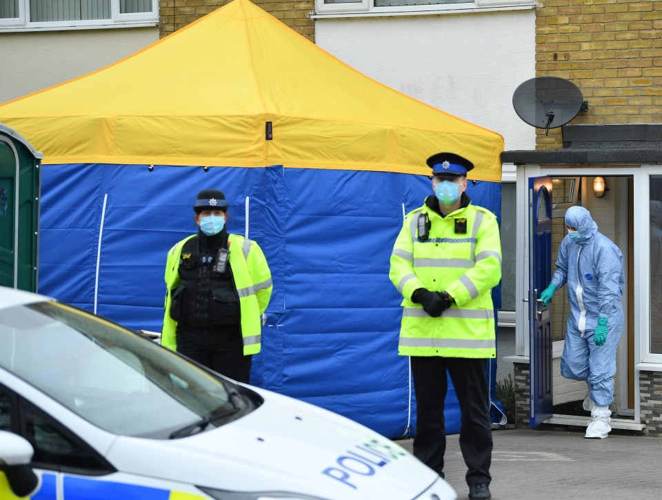 Forensic police search a home in Kent as part of the investigation