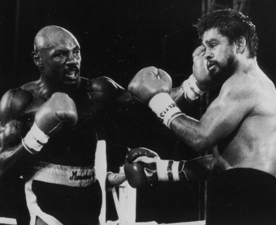 Hearns, pictured (left) beating Roberto Duran, made 12 consecutive defences of his belt