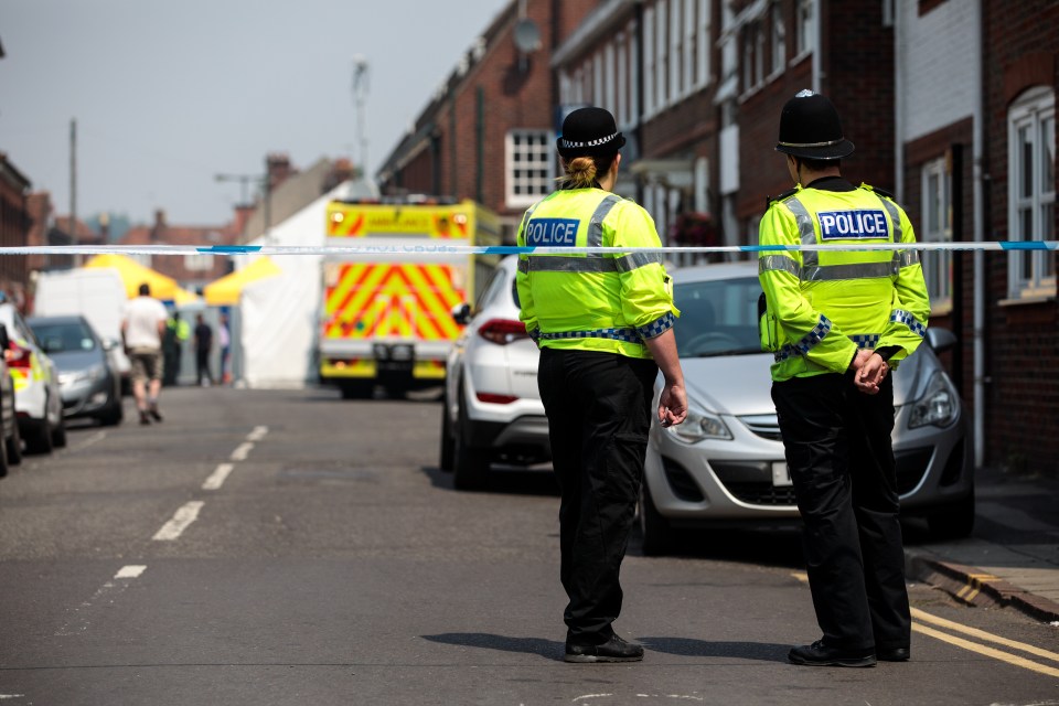 Police officers stand outside the John Baker House Sanctuary Supported Living in Salisbury, after a man and woman were exposed to the Novichok nerve agent on July 6, 2018