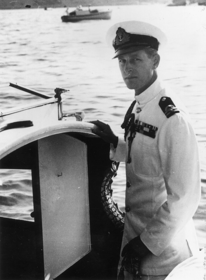 Prince Philip, Duke of Edinburgh in naval uniform on a boat in Malta