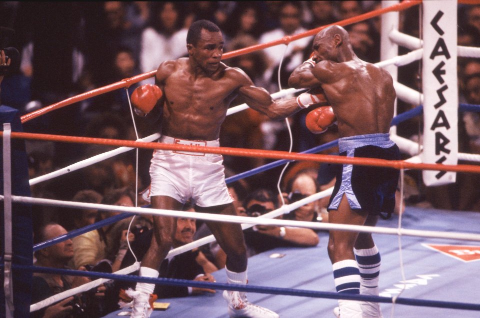 Hagler's defeat to Sugar Ray Leonard (left) is regarded as one of the most controversial ever