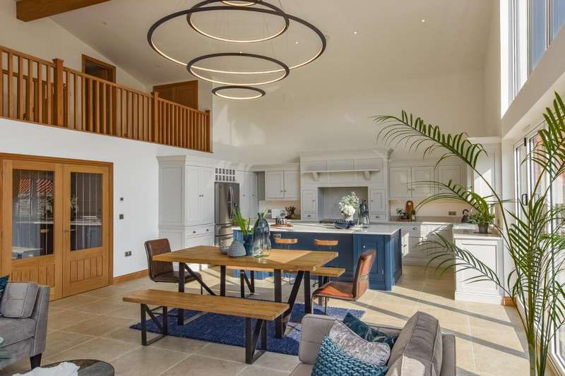 The kitchen area flows seamlessly into the living area