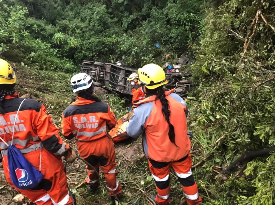 Emergency services hunt for survivors after the packed coach crashed down a hillside