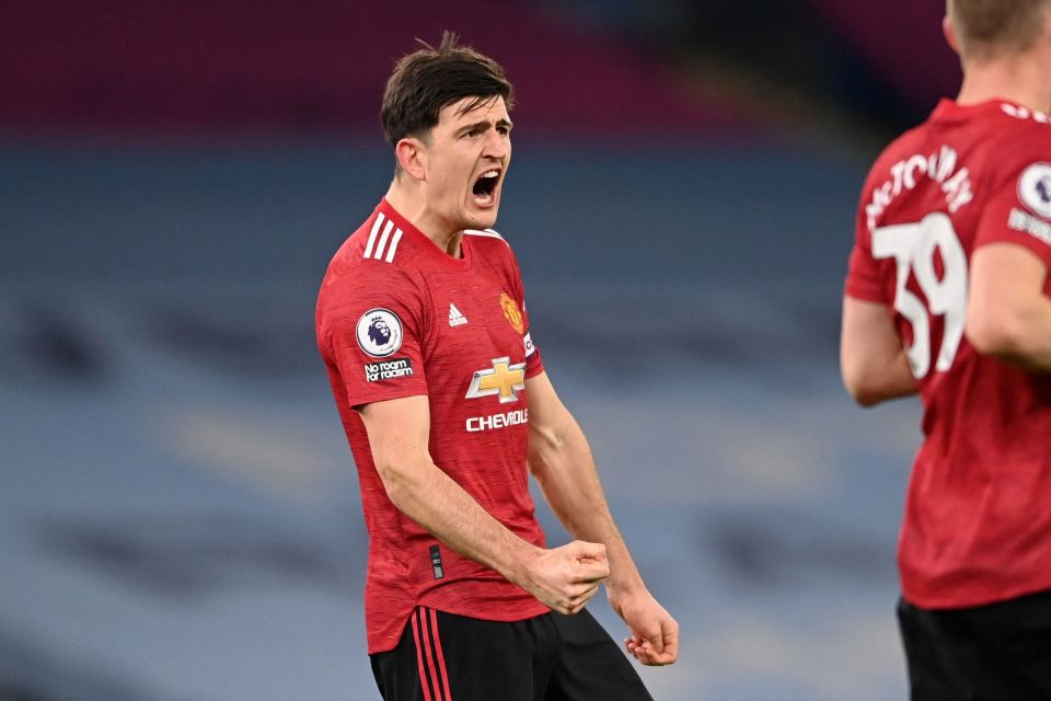 Harry Maguire celebrates Man Utd's win at City