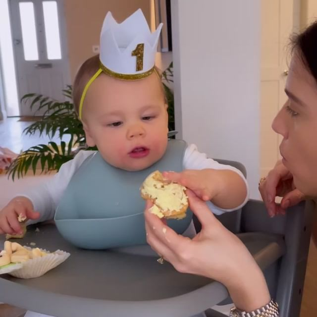 Lucy feeding Ryan the cake