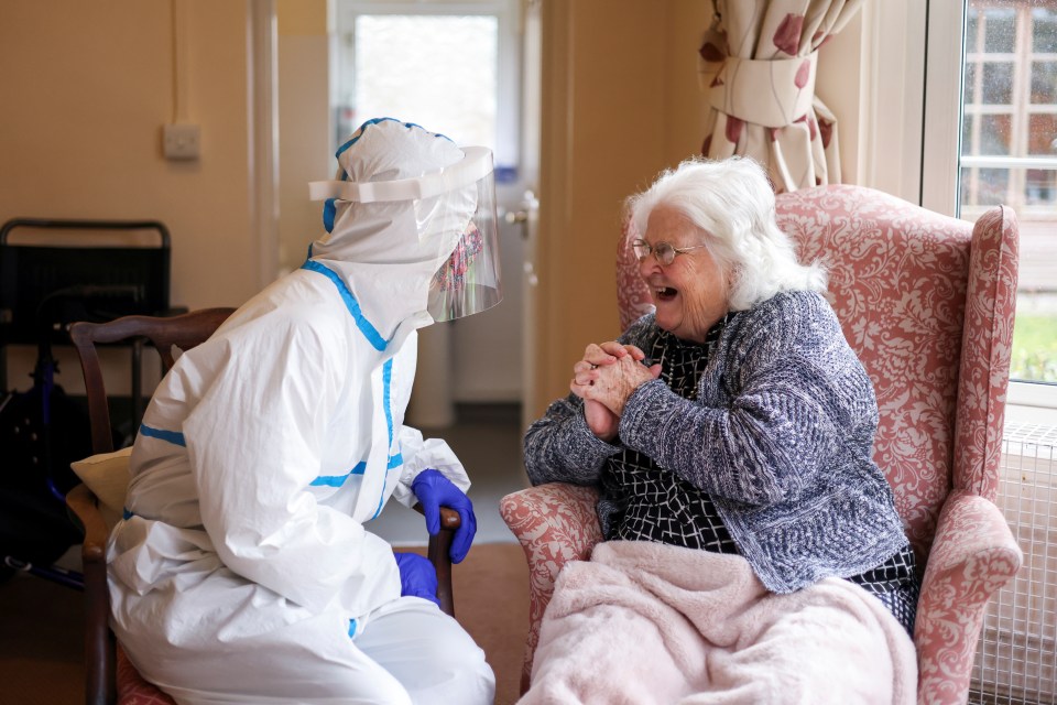 Nicky Clough visits her mum Pam Harrison at Alexander House Care Home for the first time in London, March 8 2021