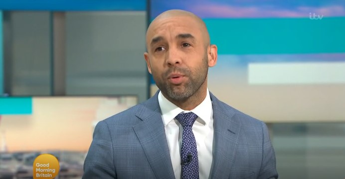 Alex Beresford held back tears as he spoke about his own experience with racism