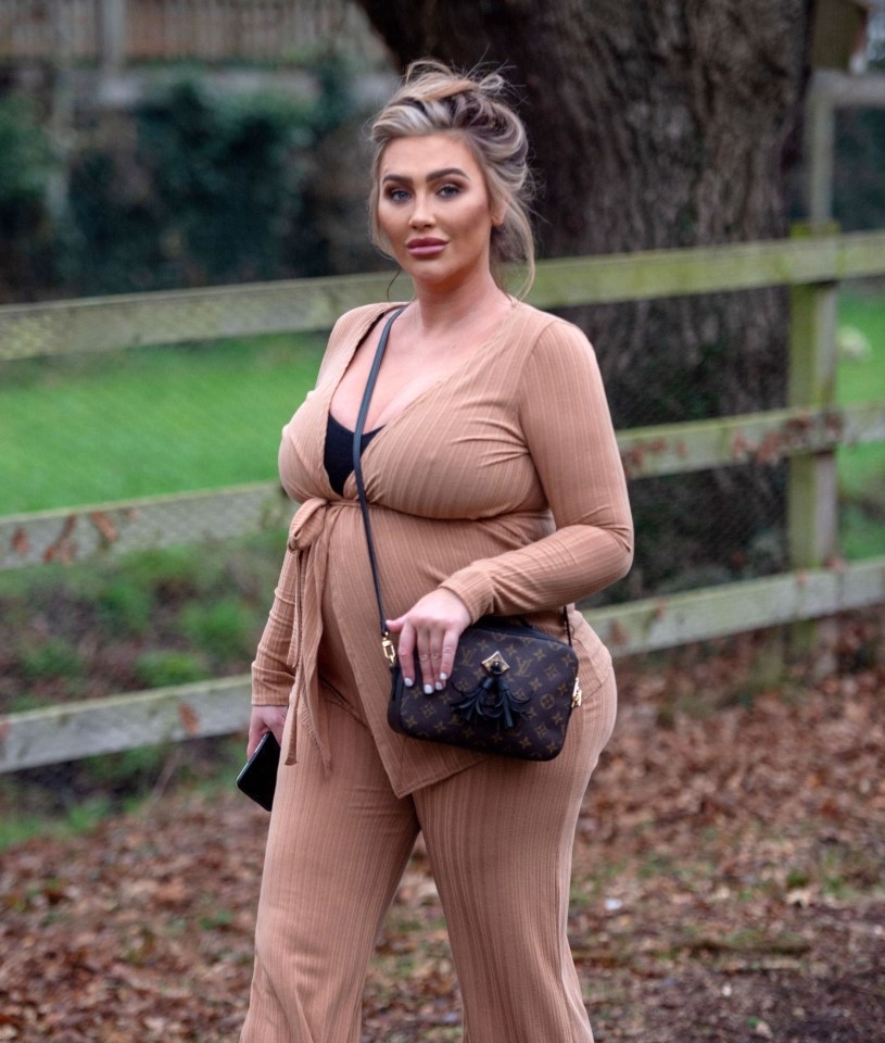 Lauren Goodger showed off her baby bump in a chic beige jumpsuit