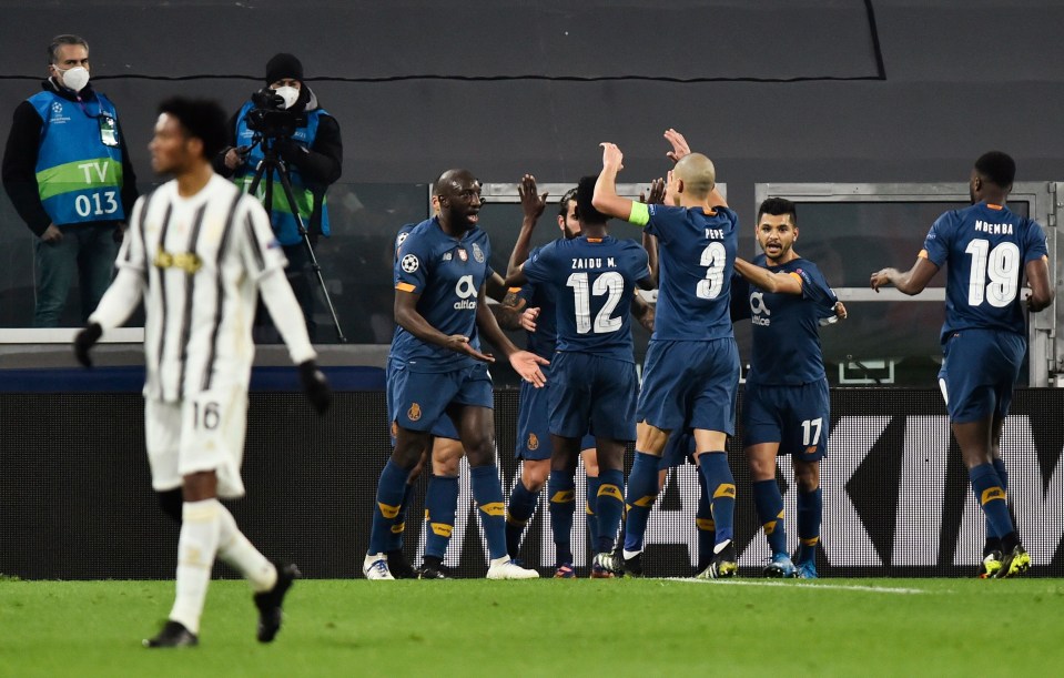 Porto celebrated after Sergio Oliveira’s early penalty put them within touching distance of the quarter-finals