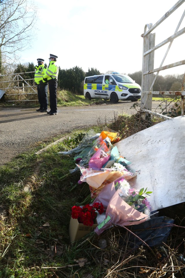 Flowers left by members of the public near to an area of woodland in Ashford in Kent