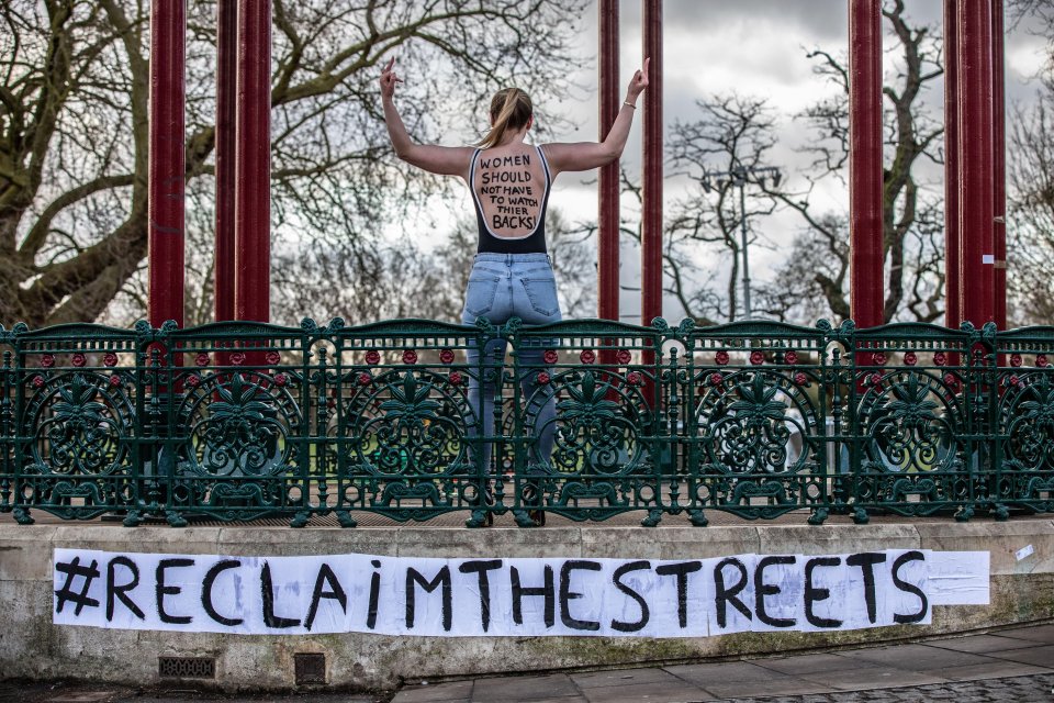 A protester is pictured in the bandstand earlier