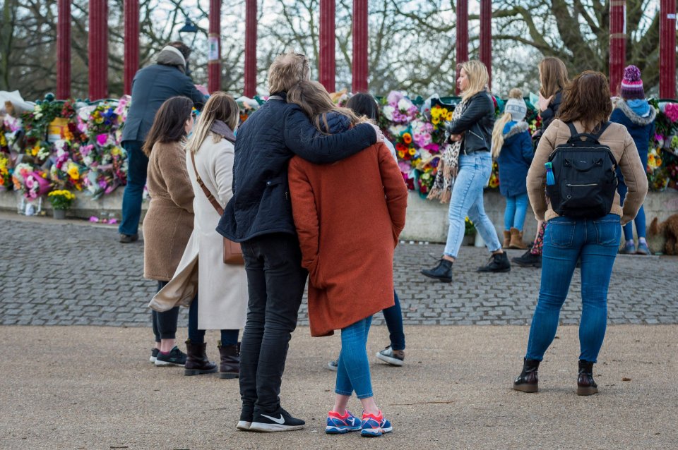 Friends and family comforted one another in Clapham