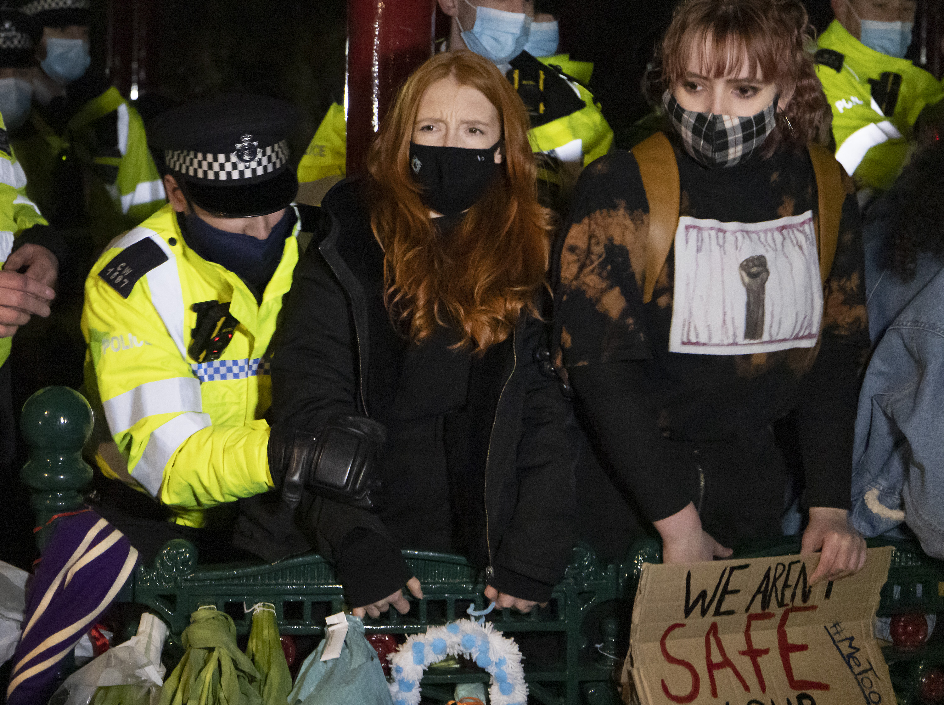 Mourners clashed with cops at the vigil in London last night