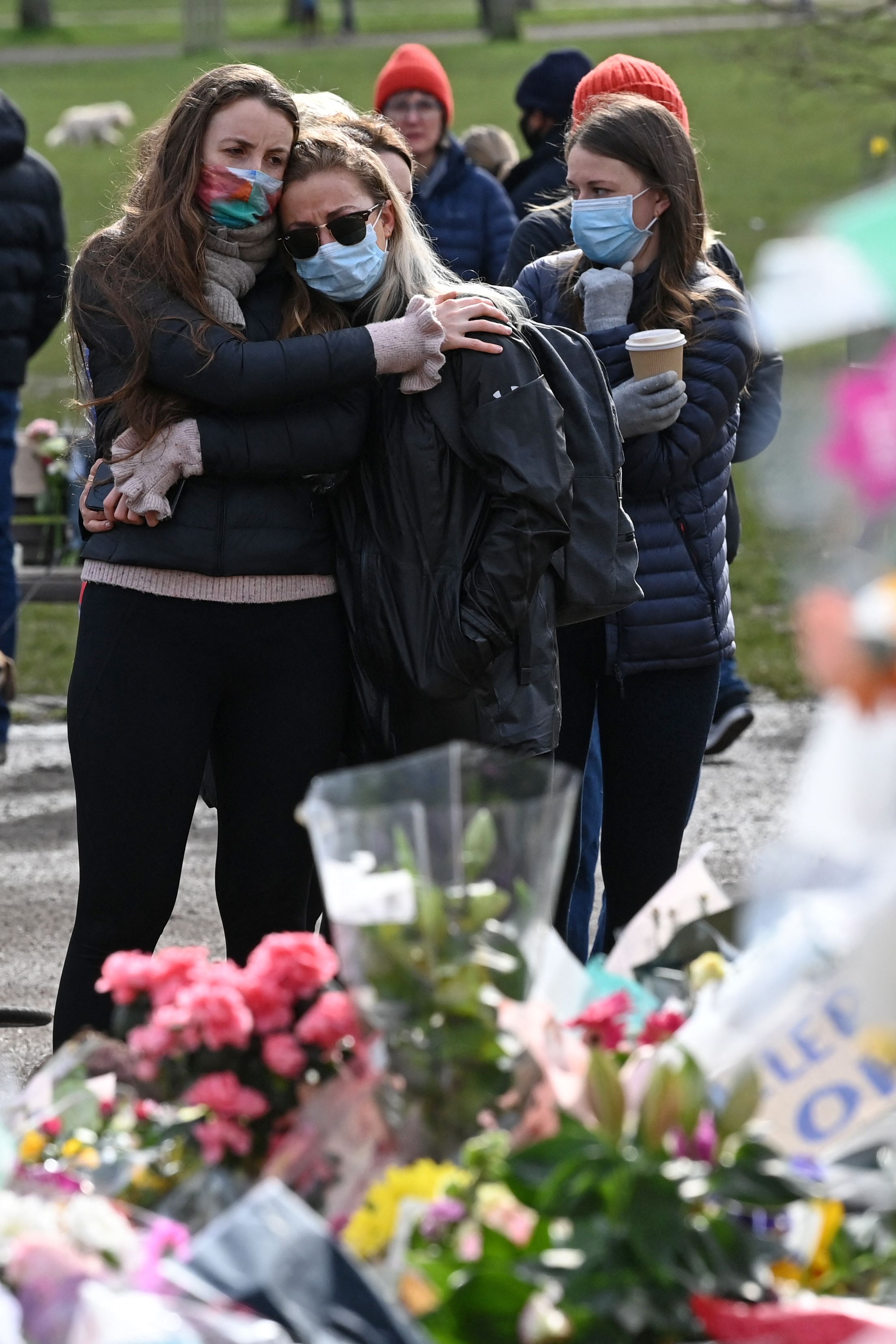 Wellwishers comforted each other as people returned to the Clapham bandstand today to pay their respects to Sarah