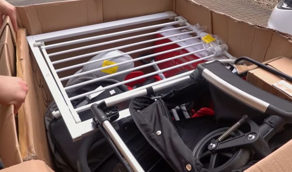 The box contained a baby gate, pram, two highchairs, two bikes and toys