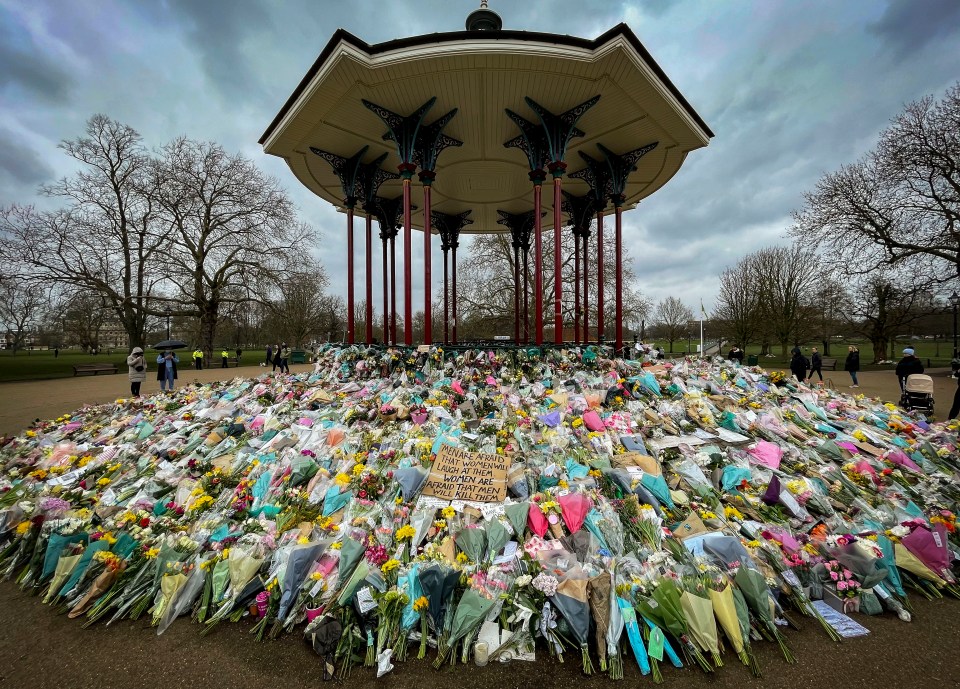 A sea of flowers at Clapham Common grandstand following clashes between police and women attending a vigil to Sarah Everard