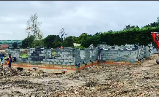 The first bricks went up on the property last week