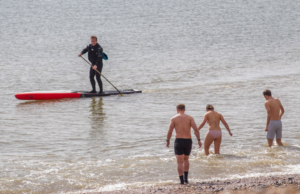 Brave swimmers waded into the water in Brighton